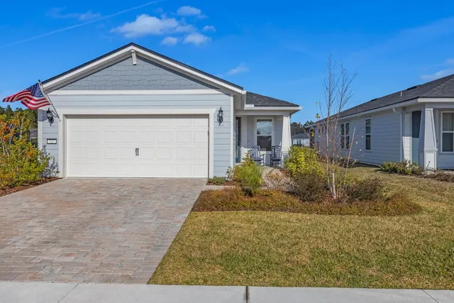 a front view of house with yard