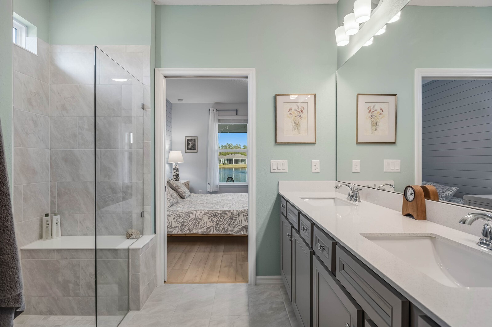 727 Cool Breeze Way Yulee, FL 32097 - Photo 11 of 31 a en suite bathroom with a double vanity sink and a mirror