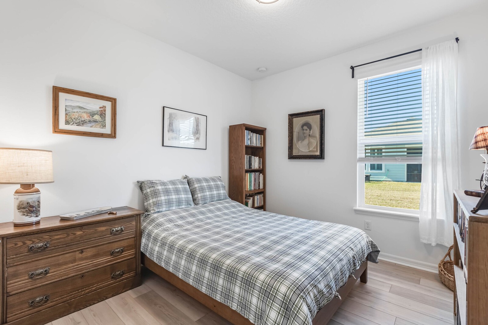 727 Cool Breeze Way Yulee, FL 32097 - Photo 12 of 31 a bedroom with a bed and a window