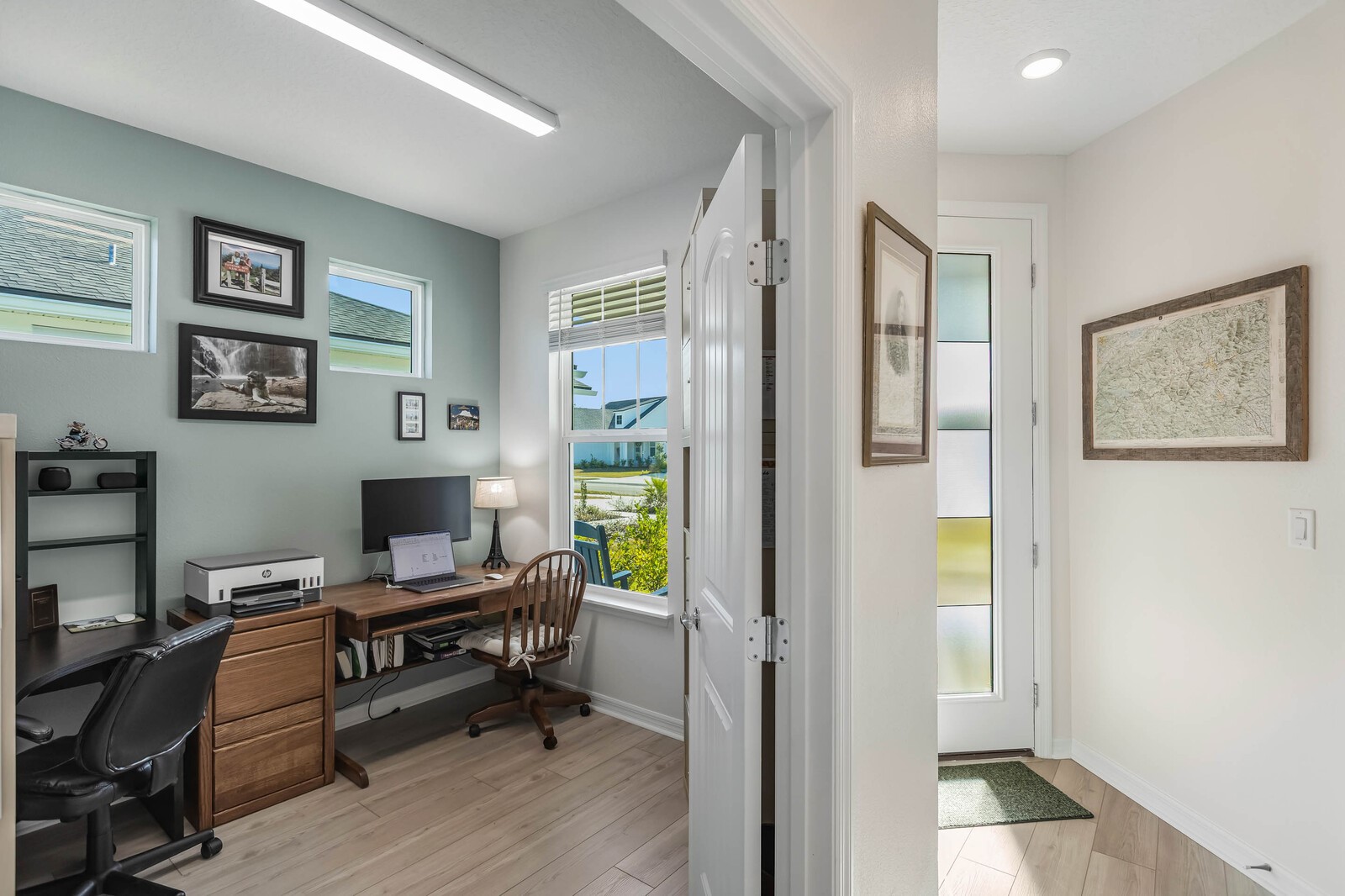 727 Cool Breeze Way Yulee, FL 32097 - Photo 14 of 31 a view of a workspace with furniture and a window