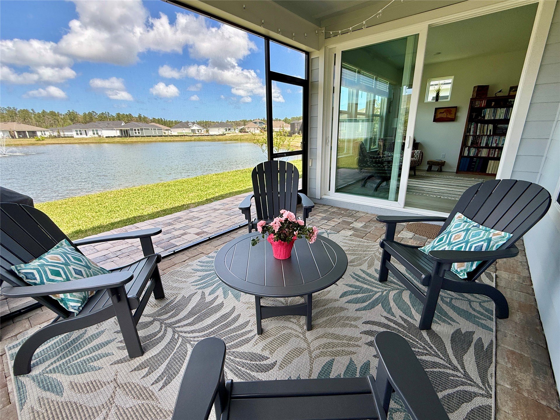 727 Cool Breeze Way Yulee, FL 32097 - Photo 15 of 31 a view of a balcony with chair and table