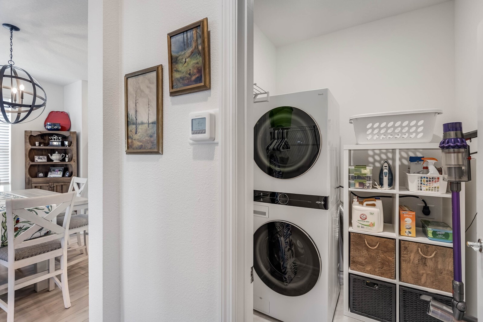 727 Cool Breeze Way Yulee, FL 32097 - Photo 16 of 31 a view of a hallway with washer and dryer