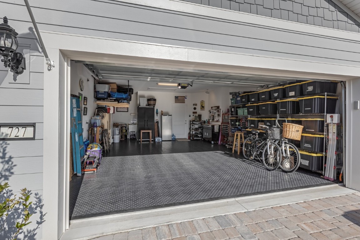 727 Cool Breeze Way Yulee, FL 32097 - Photo 18 of 34 a view of a garage