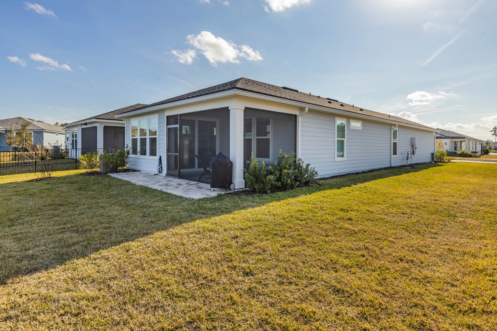727 Cool Breeze Way Yulee, FL 32097 - Photo 23 of 31 a front view of a house with garden