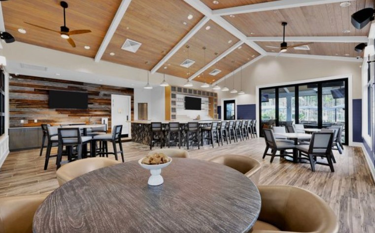 727 Cool Breeze Way Yulee, FL 32097 - Photo 29 of 31 a view of a dining room with furniture window and wooden floor