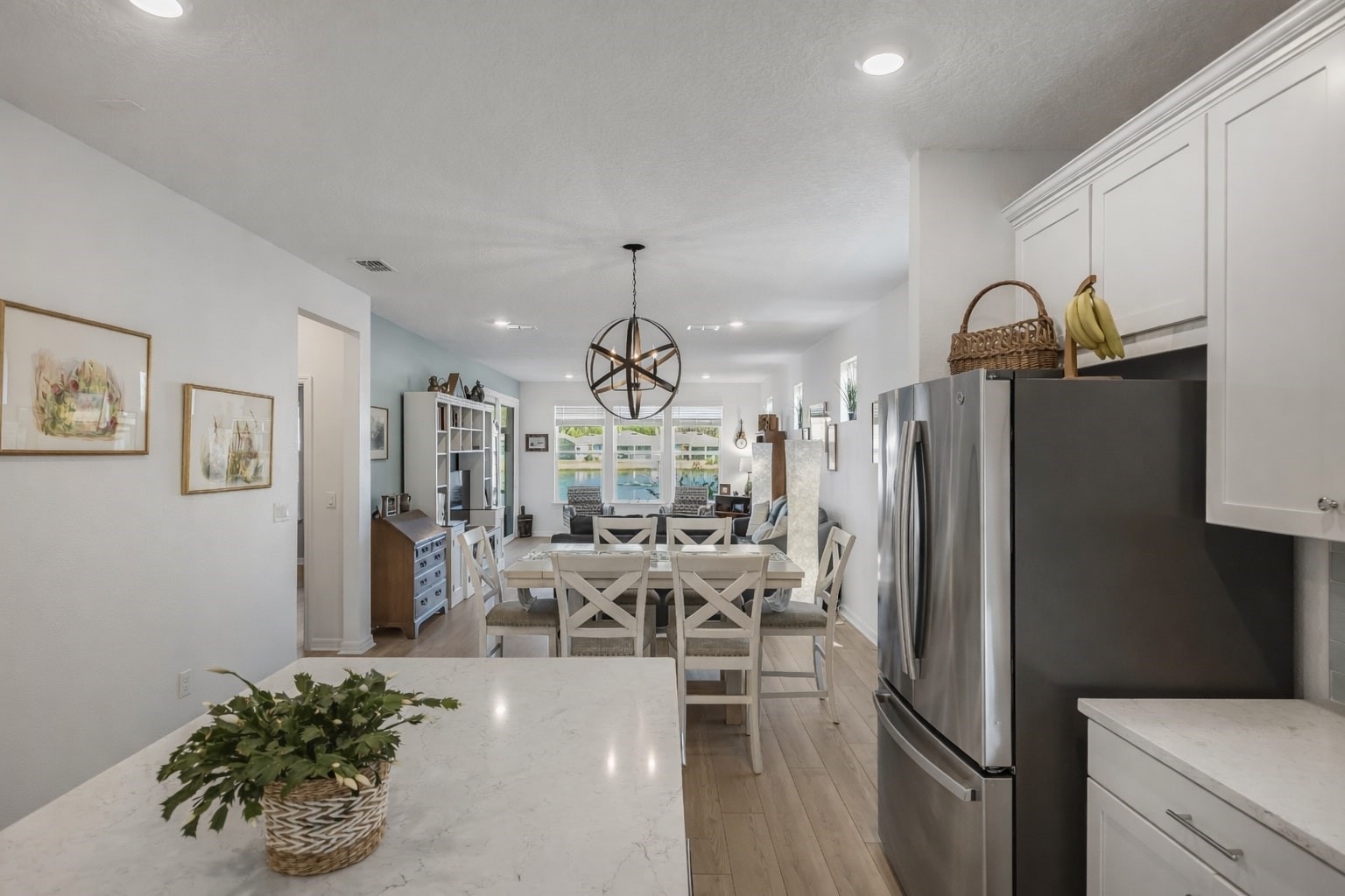 727 Cool Breeze Way Yulee, FL 32097 - Photo 4 of 31 a kitchen with stainless steel appliances granite countertop a refrigerator and a sink
