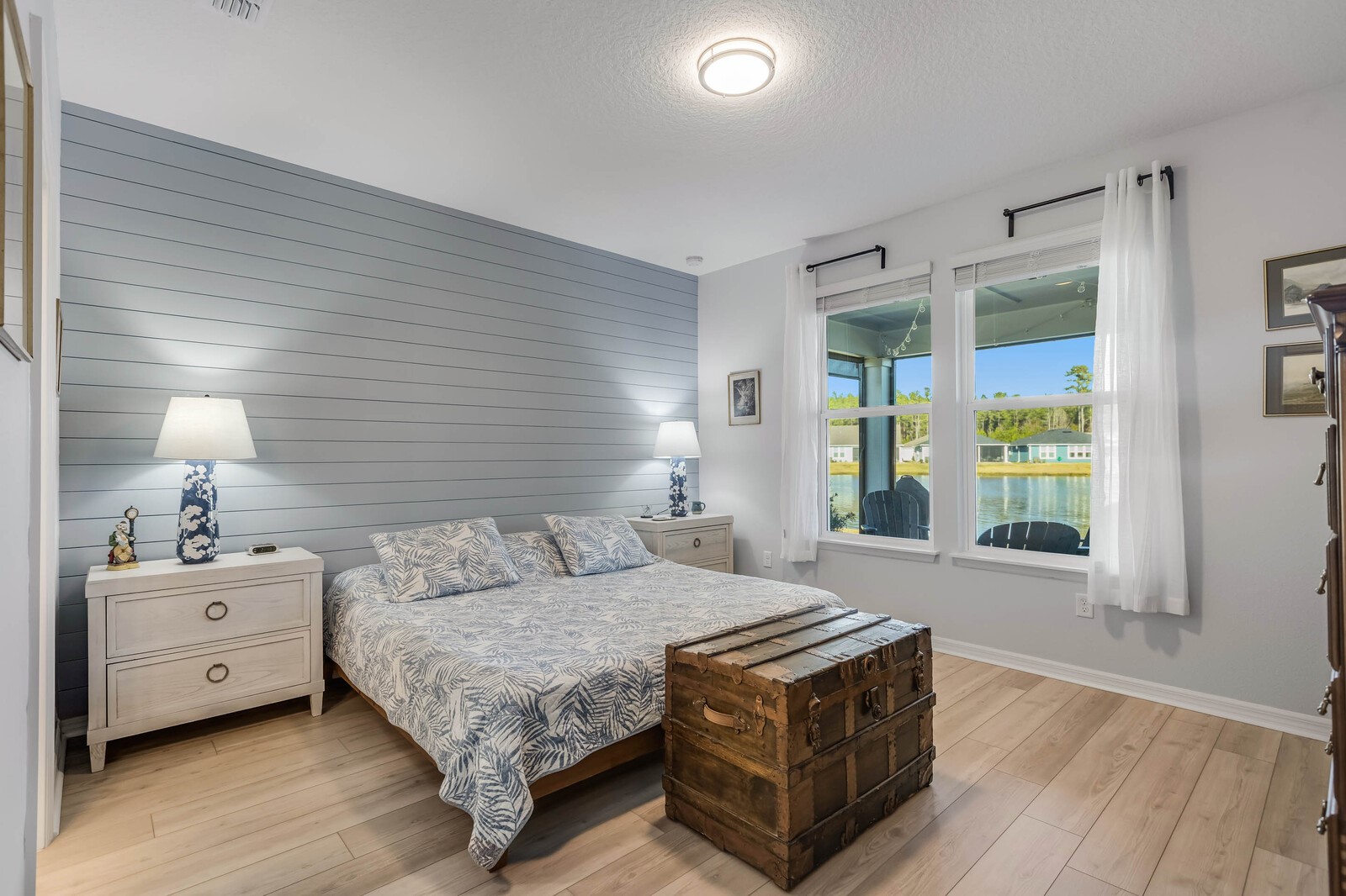 727 Cool Breeze Way Yulee, FL 32097 - Photo 10 of 31 a spacious bedroom with a bed and a window