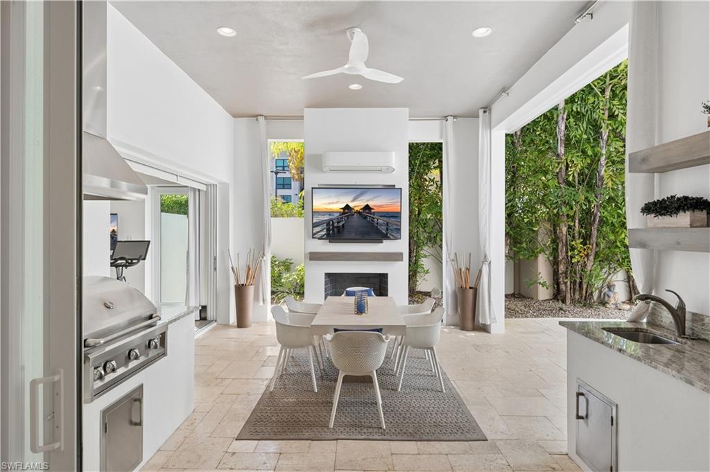 9214 Mercato Way Naples, FL 34108 - Photo 2 of 9 Outdoor Living with Air Conditioning and Heating