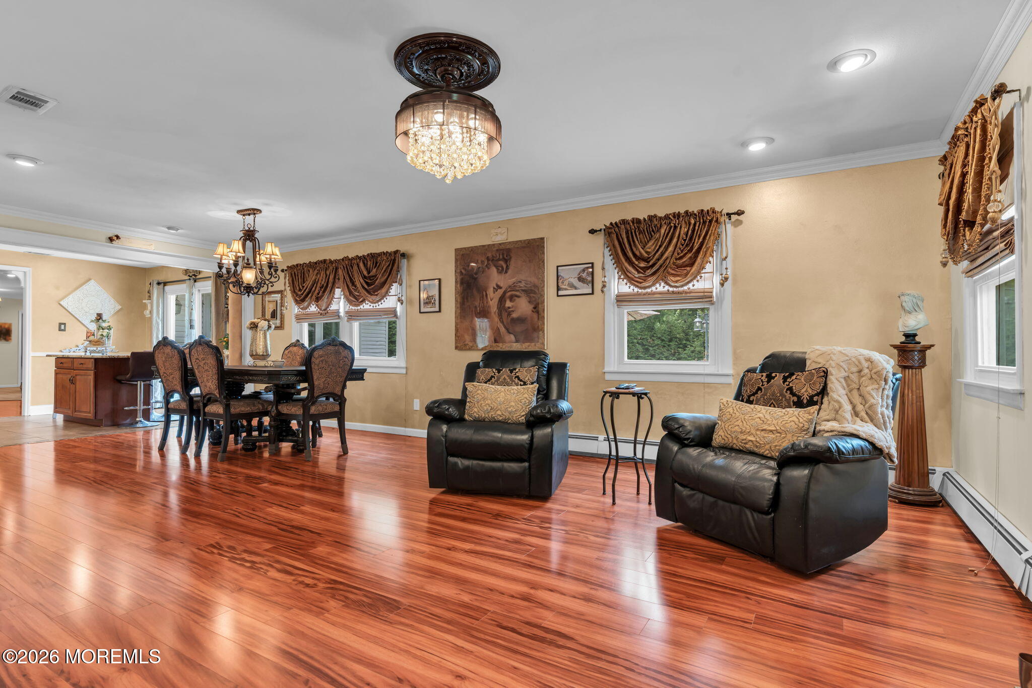8 Owens Road Marlboro, NJ 07746 - Photo 23 of 39 a living room with furniture and a wooden floor