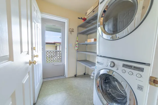 a view of room with furniture and wooden floor