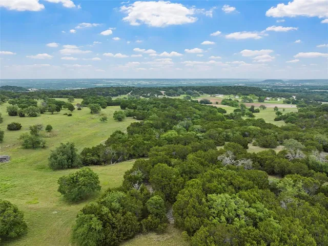 a view of outdoor space and a yard
