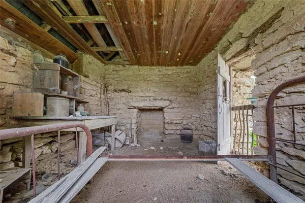 a view of a fireplace with windows