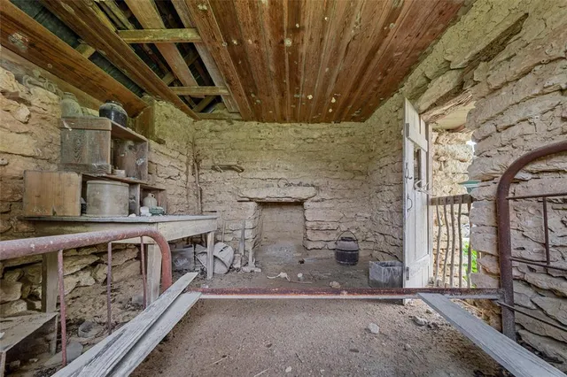 a view of a fireplace with windows