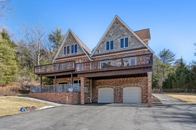 a kitchen with lots of counter top space a sink and cabinets