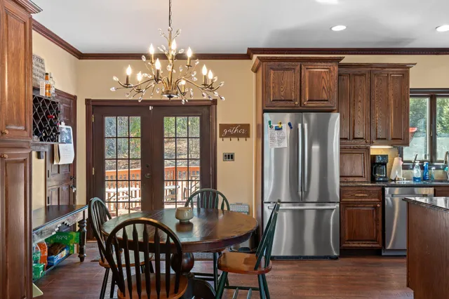 a view of hallway with livingroom and furniture