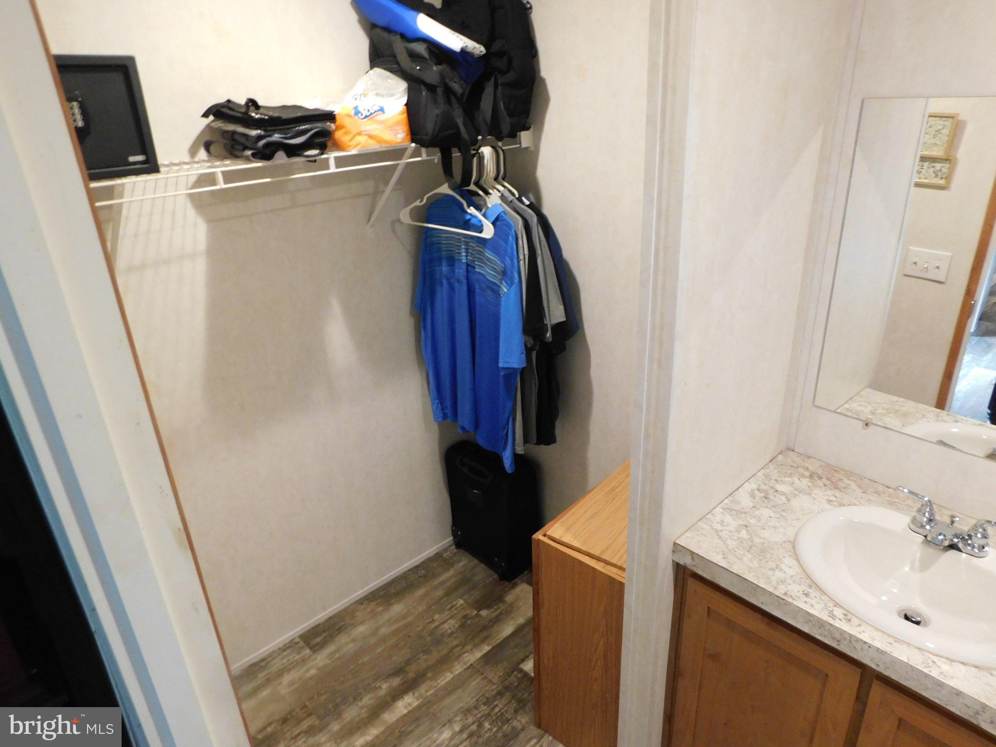 119 Meadow Lane Lititz, PA 17543 - Photo 7 of 13 a bathroom with a granite countertop sink and a mirror