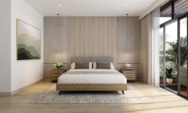 a bedroom with a large bed and a window