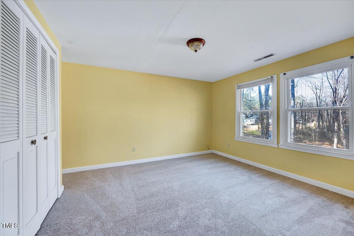 1831 Milan Street Durham, NC 27704 - Photo 20 of 38 an empty room with windows