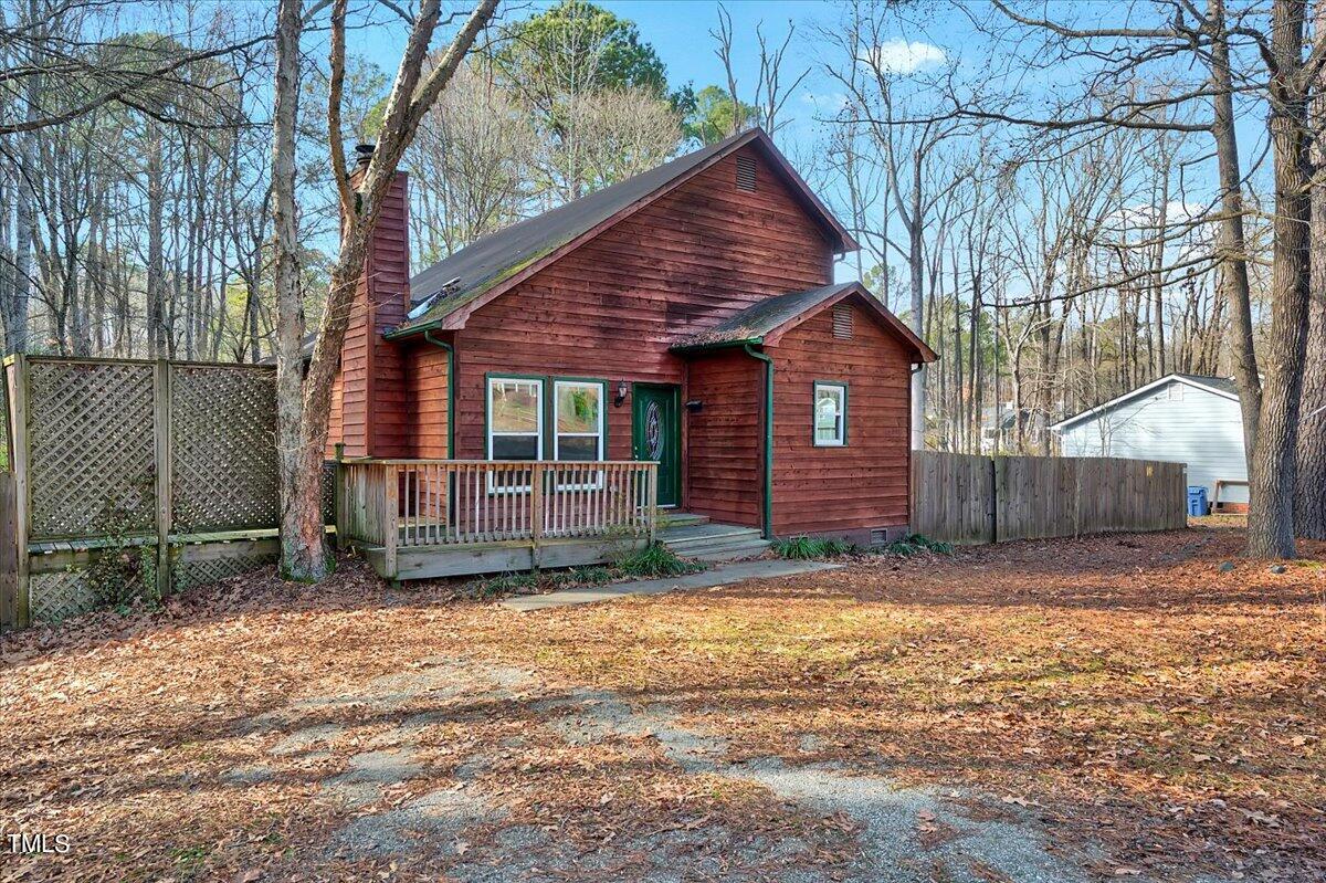 1831 Milan Street Durham, NC 27704 - Photo 2 of 38 a view of a house with a yard