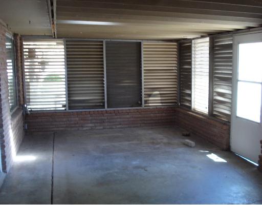 140 Fulton Place Portland, TX 78374 - Photo 8 of 10 a view of an empty room with a window
