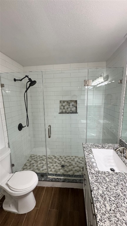 221 Hyta Street Houston, TX 77018 - Photo 16 of 35 a bathroom with a granite countertop sink toilet and shower
