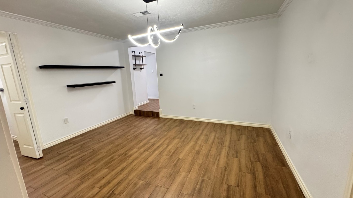 221 Hyta Street Houston, TX 77018 - Photo 24 of 35 an empty room with wooden floor