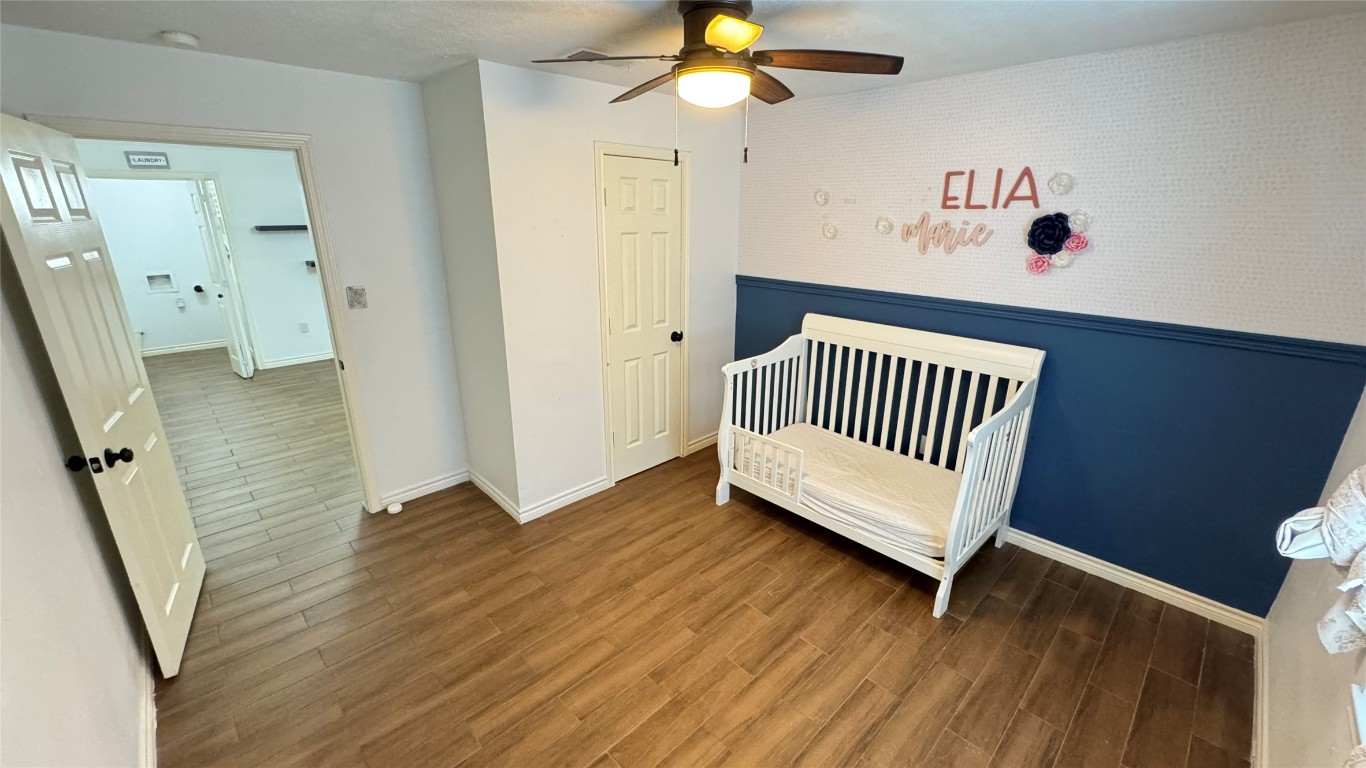 221 Hyta Street Houston, TX 77018 - Photo 27 of 35 a view of a hallway with wooden floor