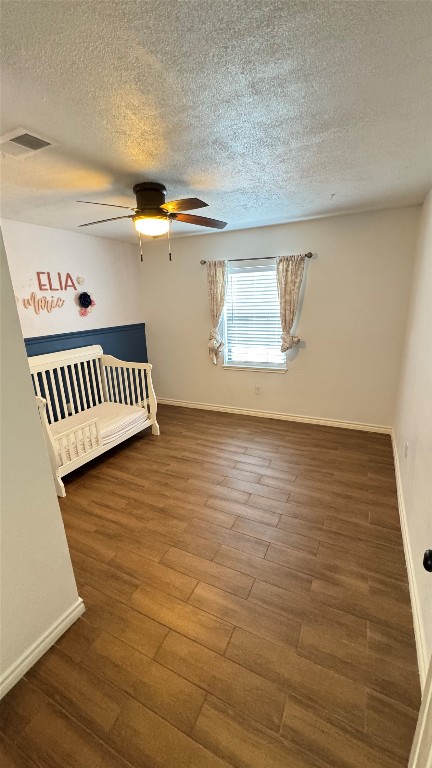 221 Hyta Street Houston, TX 77018 - Photo 28 of 35 a view of a room with wooden floor
