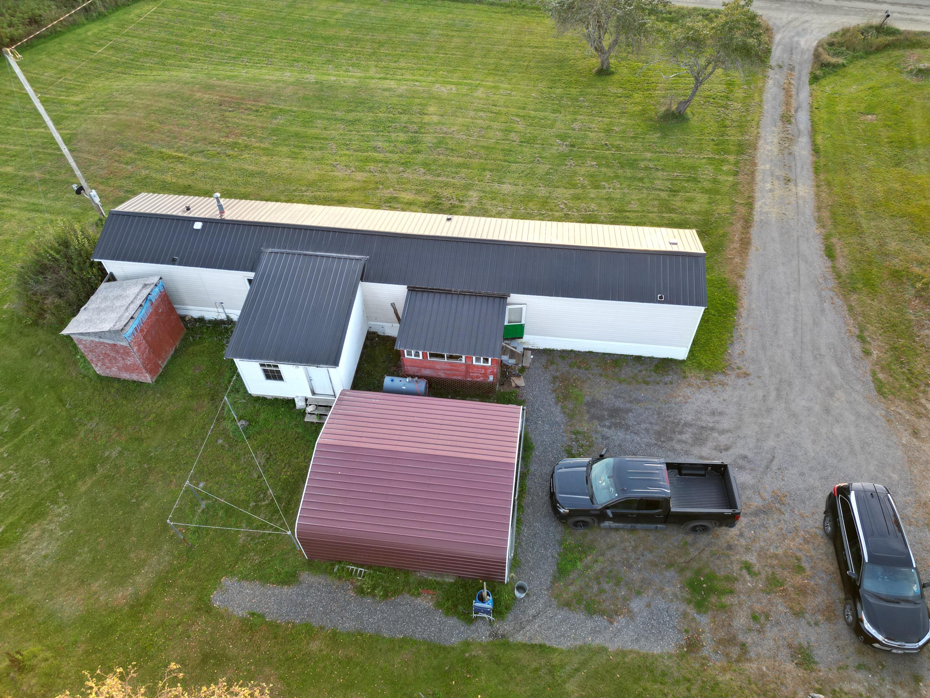 102 Reeves Road Bradford, ME 04410 - Photo 3 of 10 dji_fly_20221004_185450_357_166492064982