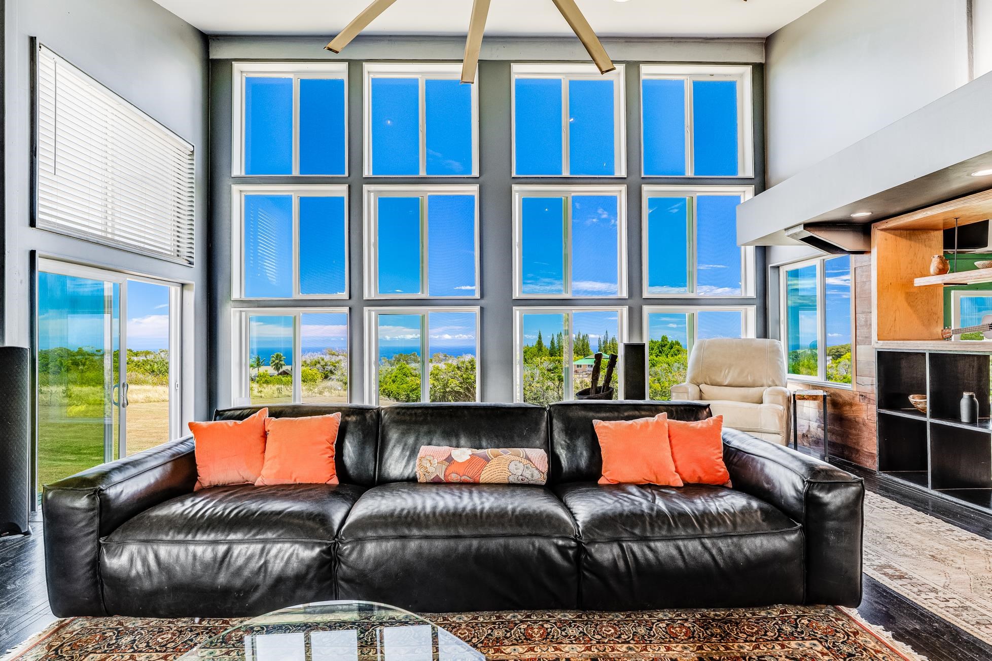 796 Awalau Road Haiku, HI 96708 - Photo 16 of 50 a living room with furniture and a window