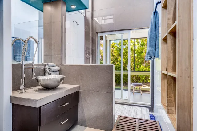 a kitchen with a table and chairs