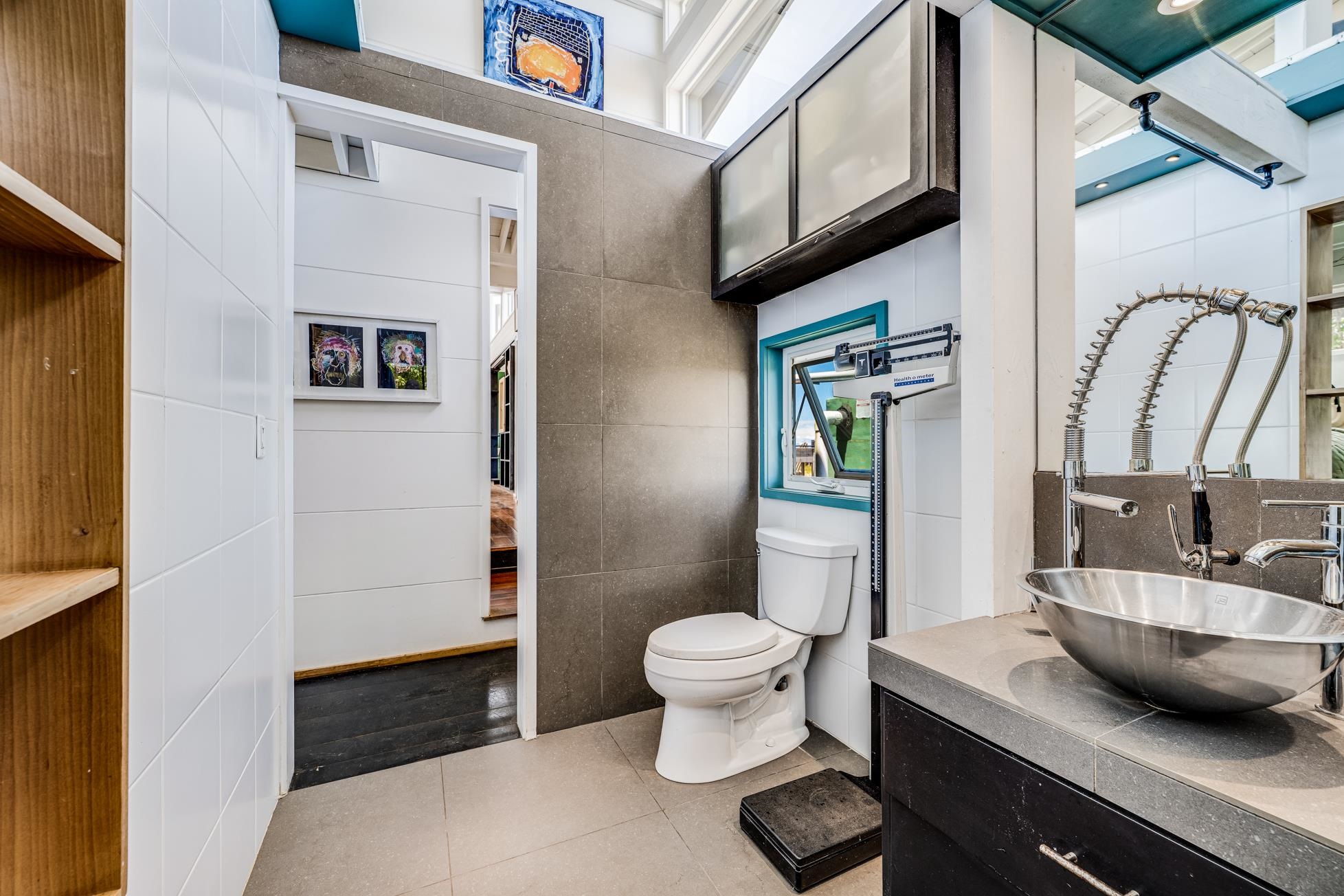 796 Awalau Road Haiku, HI 96708 - Photo 20 of 50 a bathroom with a sink a toilet and shower