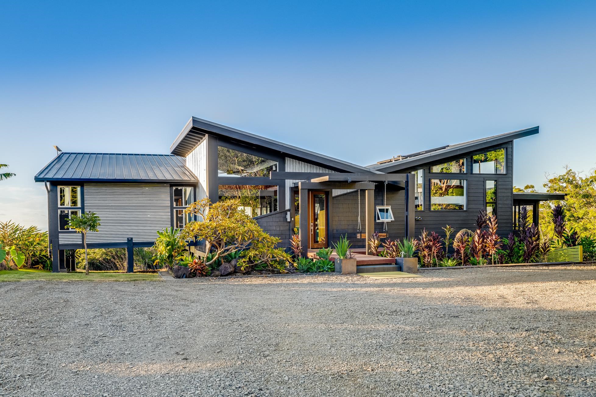 796 Awalau Road Haiku, HI 96708 - Photo 2 of 50 a front view of a house