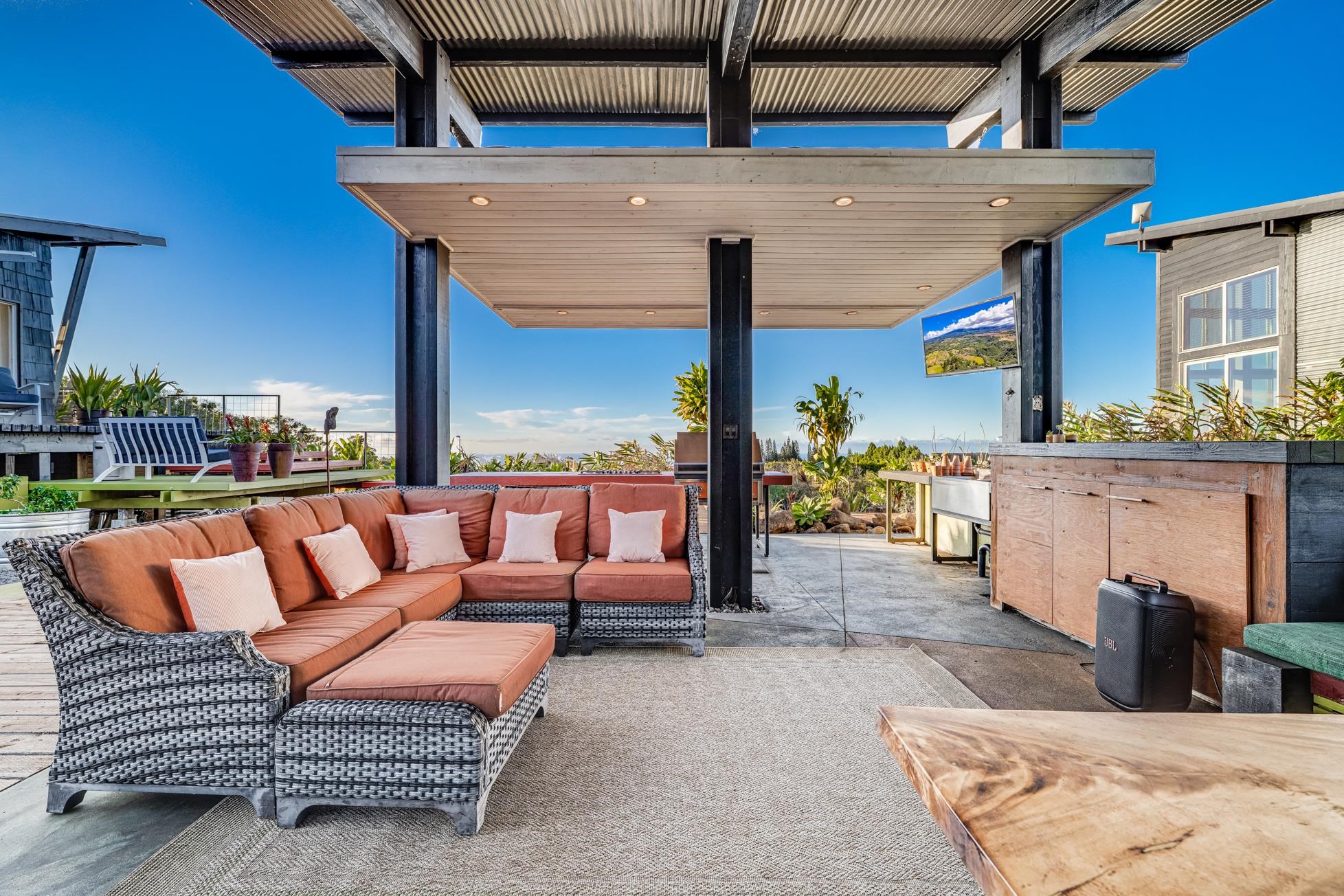 796 Awalau Road Haiku, HI 96708 - Photo 28 of 50 a outdoor living space with patio furniture and a fireplace