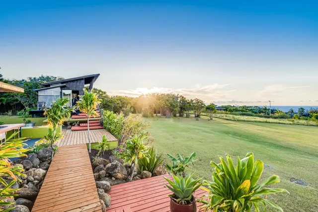 a view of outdoor sitting area with furniture