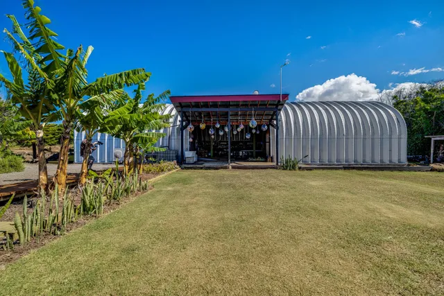 a bed room with a bed and a window