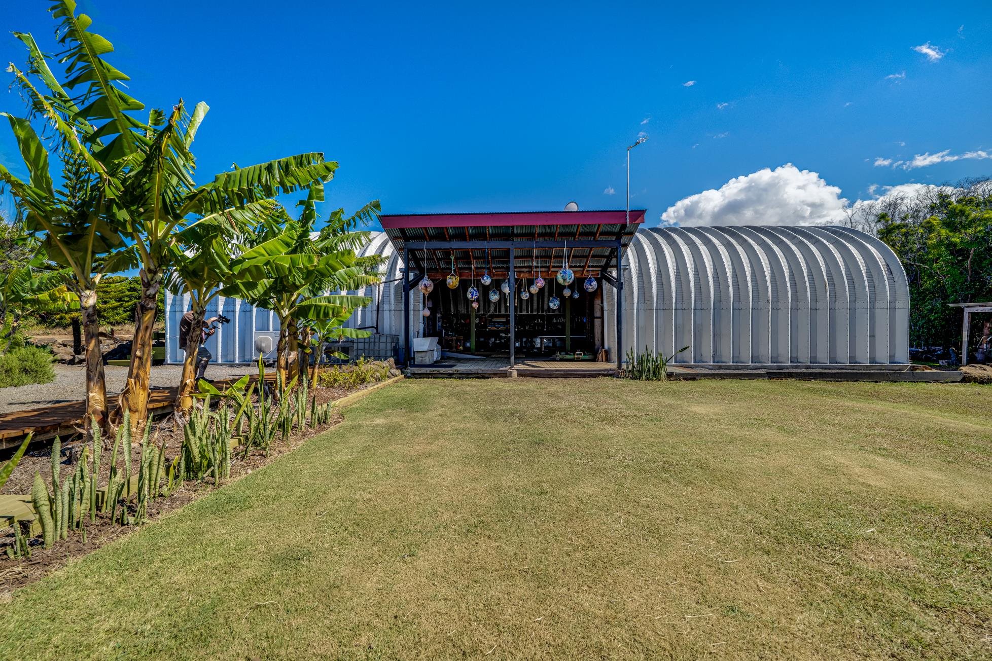 796 Awalau Road Haiku, HI 96708 - Photo 35 of 50 a view of a house with a garage