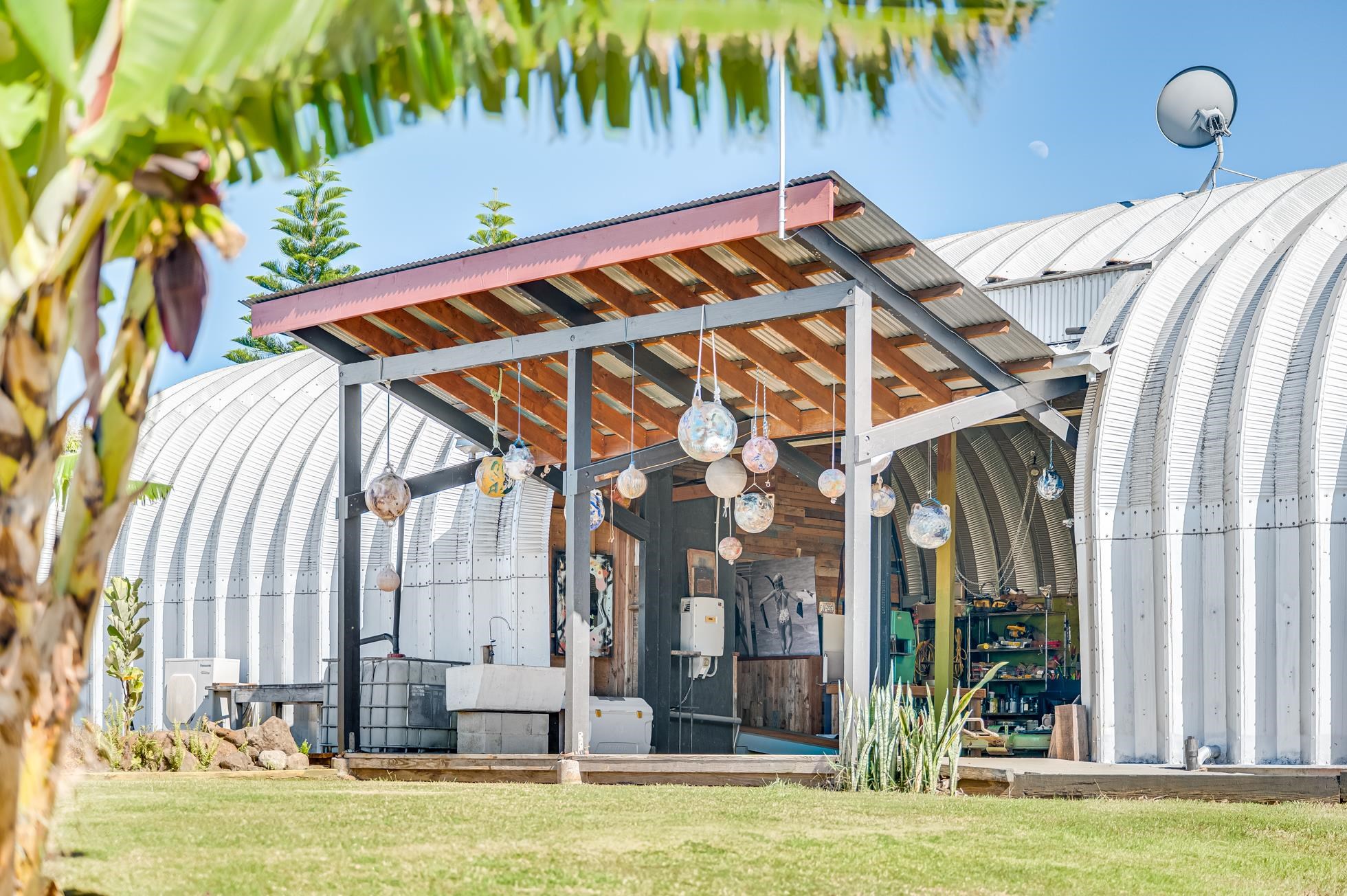 796 Awalau Road Haiku, HI 96708 - Photo 36 of 50 a bed room with a bed and a window