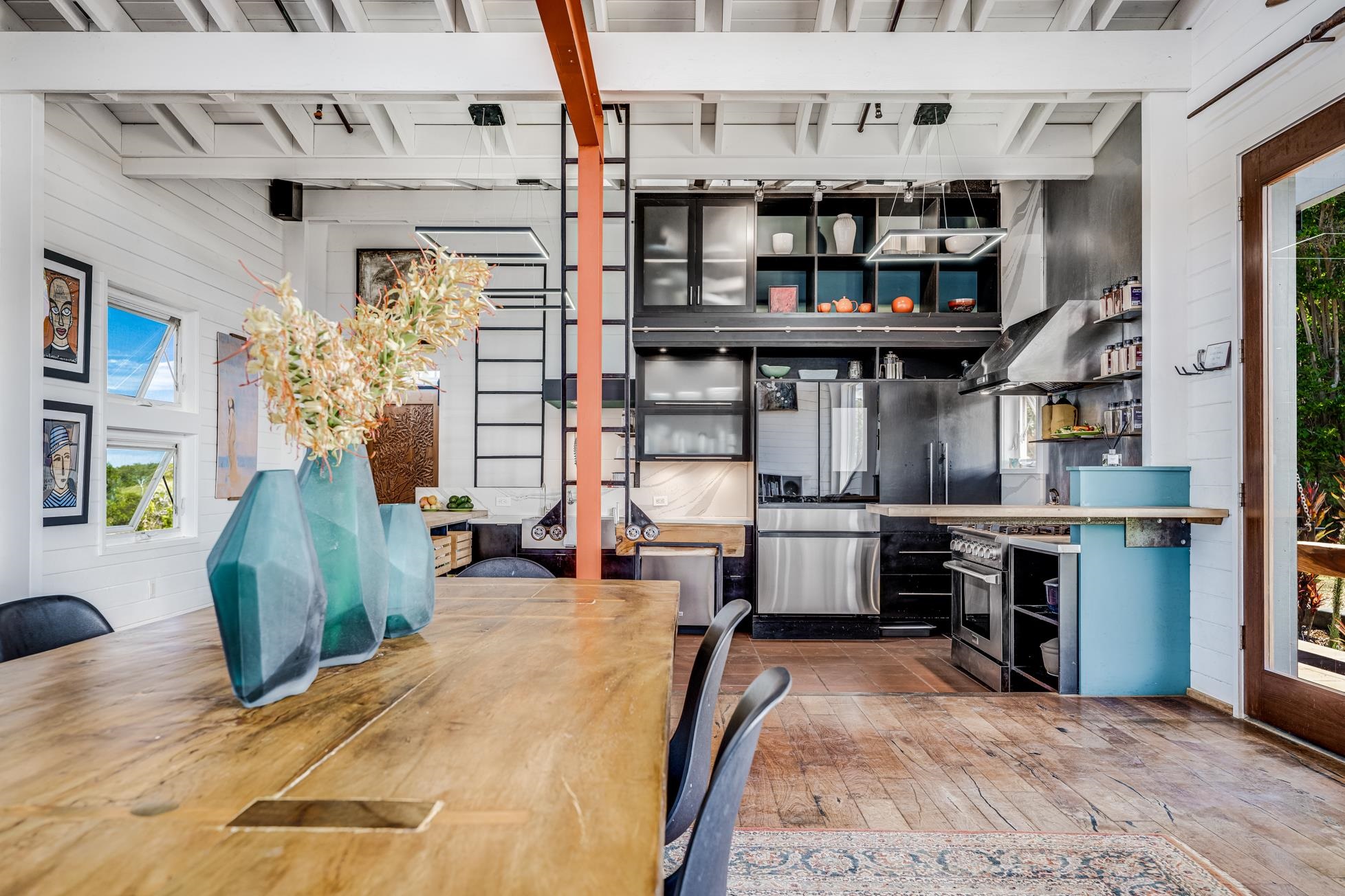 796 Awalau Road Haiku, HI 96708 - Photo 7 of 50 a view of a livingroom with furniture and staircase