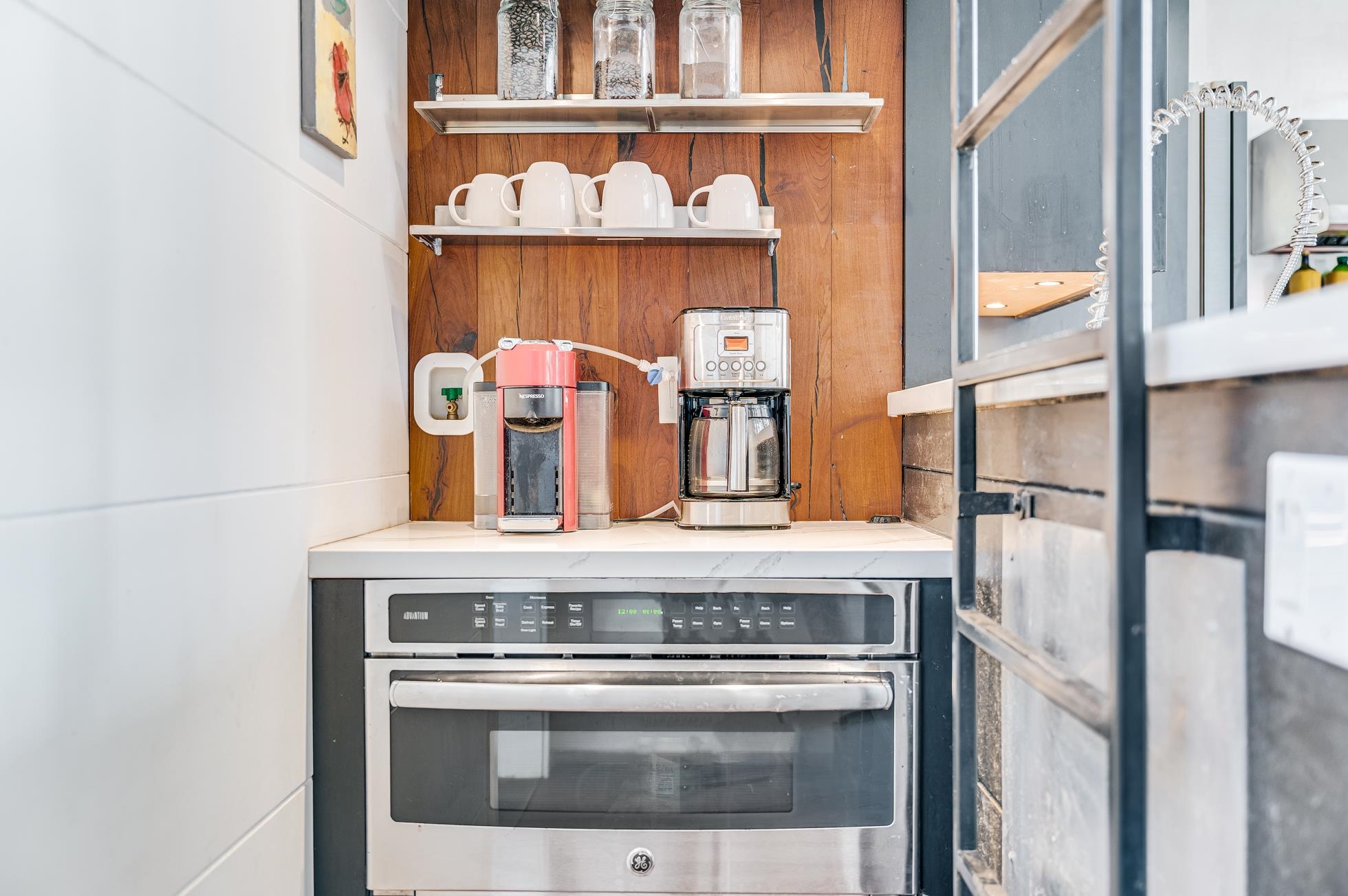 796 Awalau Road Haiku, HI 96708 - Photo 9 of 50 a stove top oven sitting inside of a kitchen