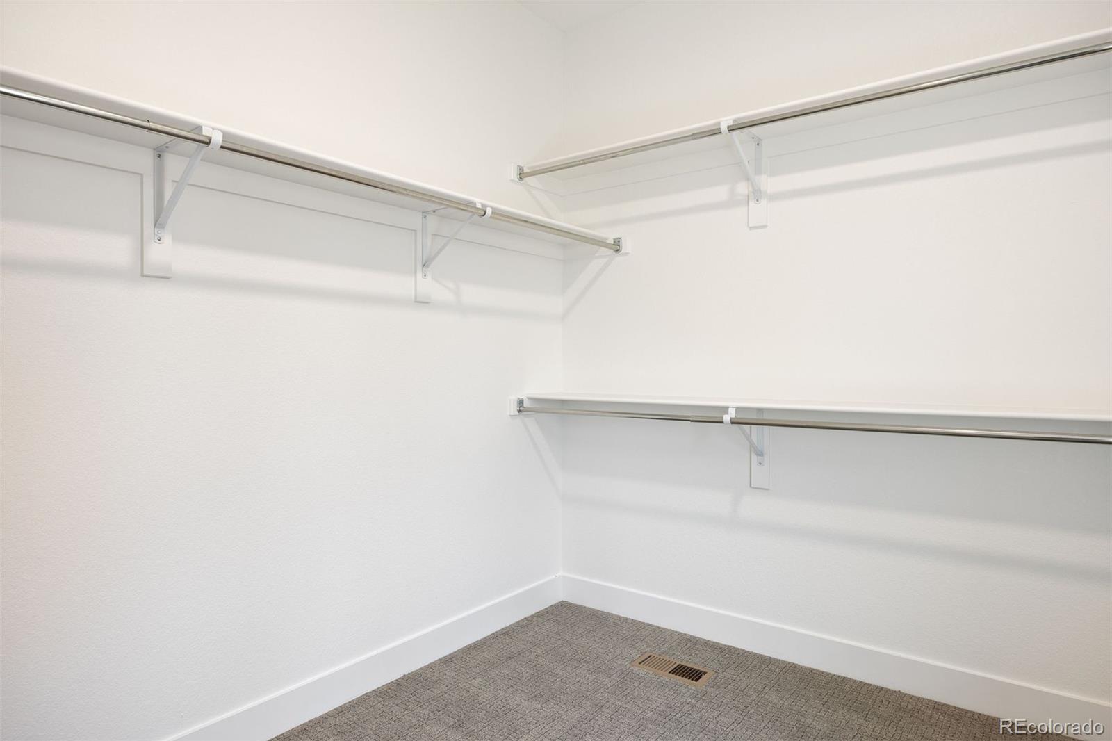 5189 Carr Street Arvada, CO 80002 - Photo 15 of 30 a view of a room with racks on the wall