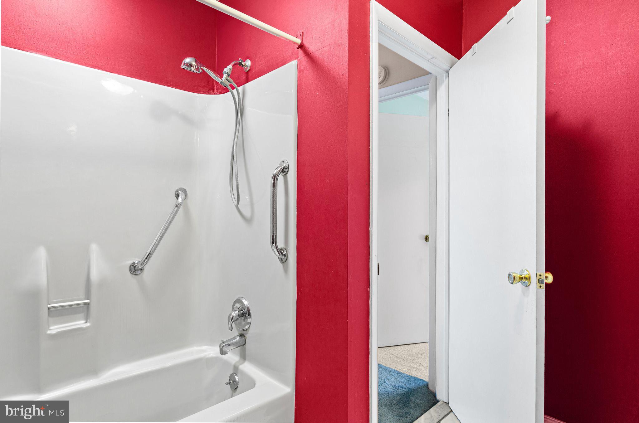 1475 Mt Holly Road, Unit B2 Edgewater Park, NJ 08010 - Photo 13 of 14 Vibrant red walls enhance this modern bath.