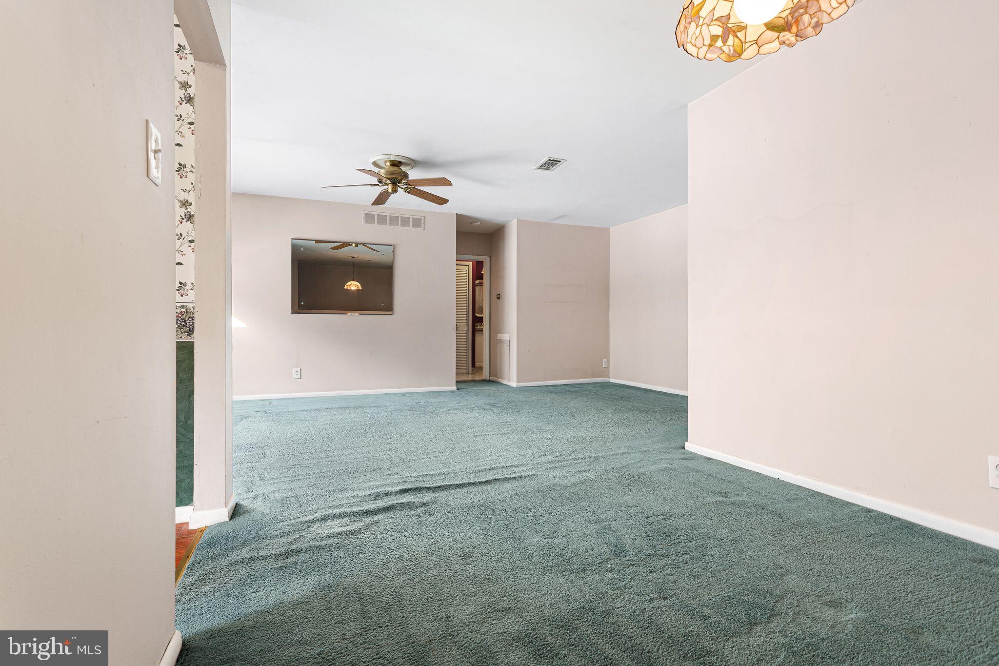 1475 Mt Holly Road, Unit B2 Edgewater Park, NJ 08010 - Photo 8 of 14 Spacious room with inviting green carpet.