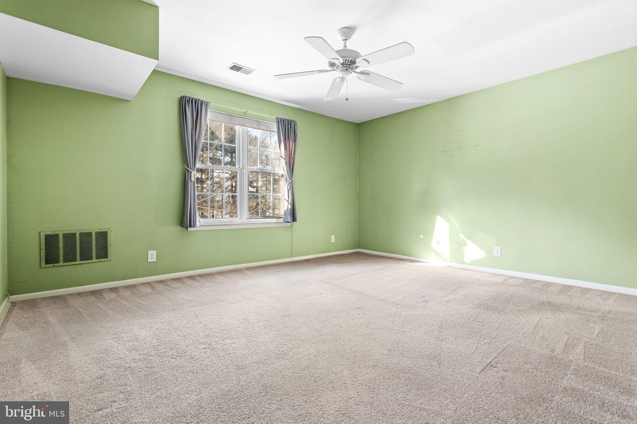 1475 Mt Holly Road, Unit B2 Edgewater Park, NJ 08010 - Photo 9 of 14 Bright, airy room with fresh green walls.