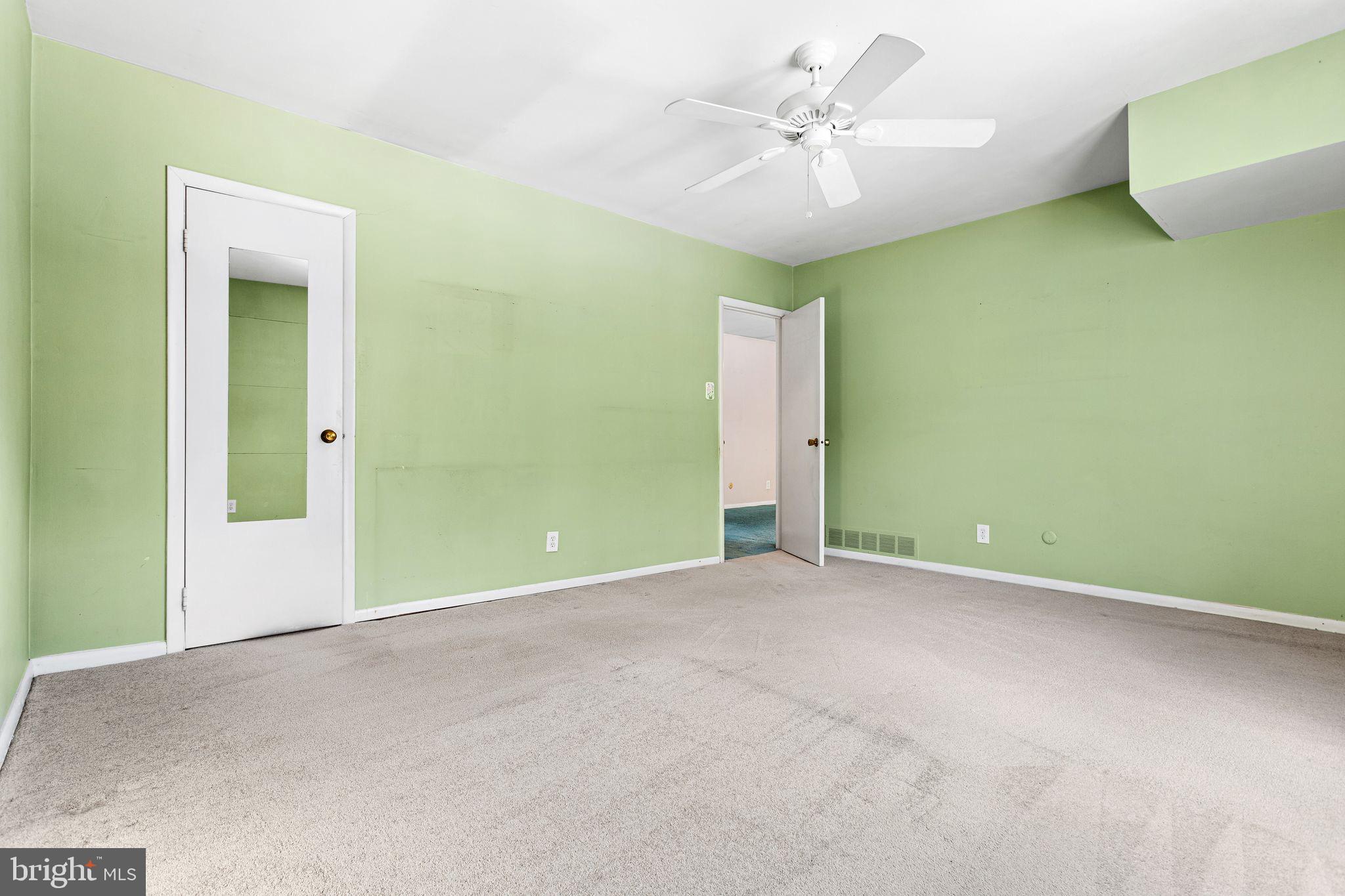 1475 Mt Holly Road, Unit B2 Edgewater Park, NJ 08010 - Photo 10 of 14 Bright and airy green-hued room awaits creativity.