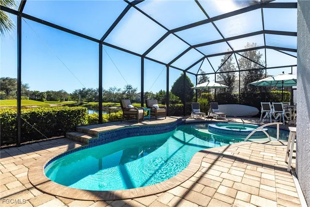 a view of sitting area in a backyard