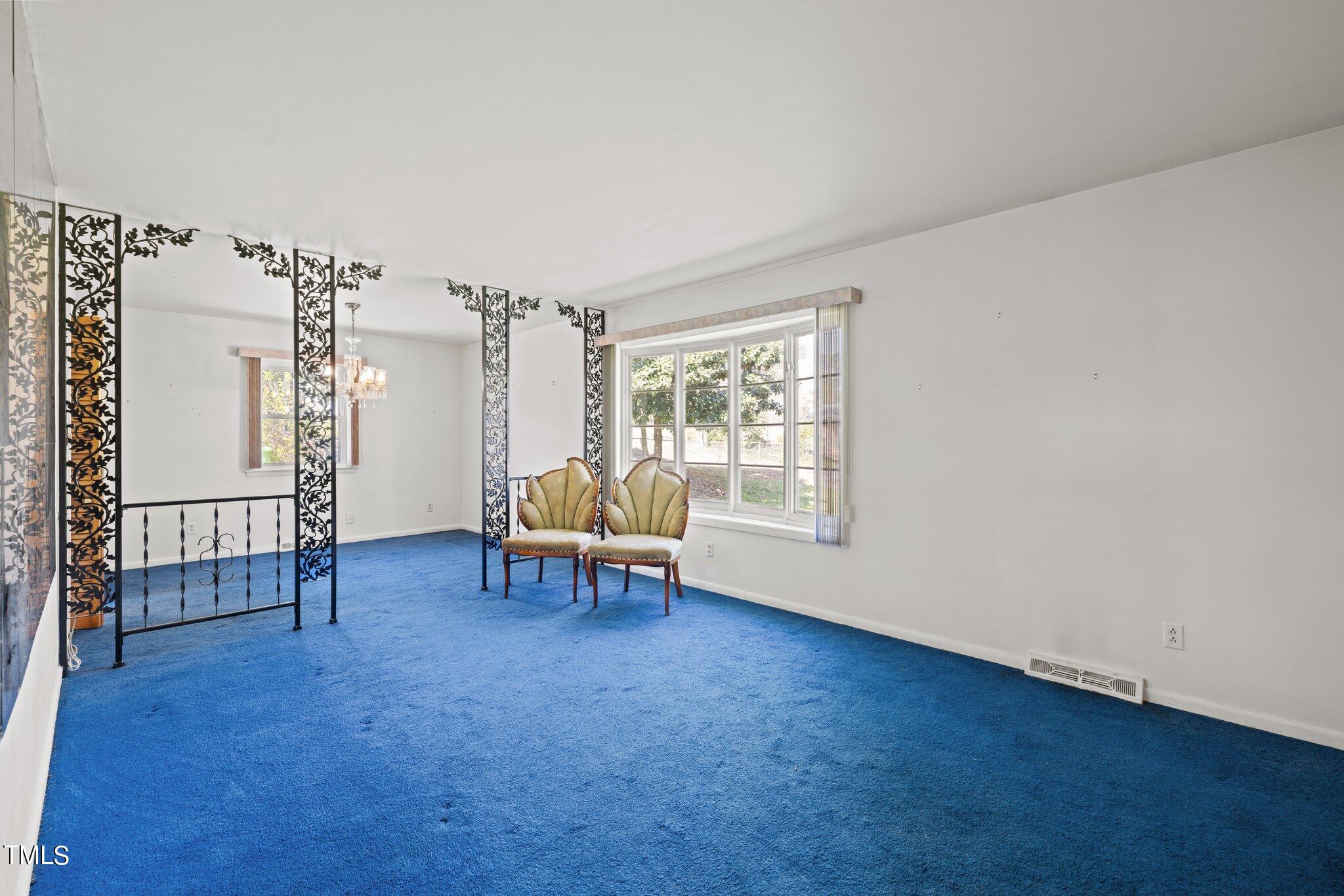 4705 Latimer Road Raleigh, NC 27609 - Photo 18 of 51 a view of livingroom with furniture and windows