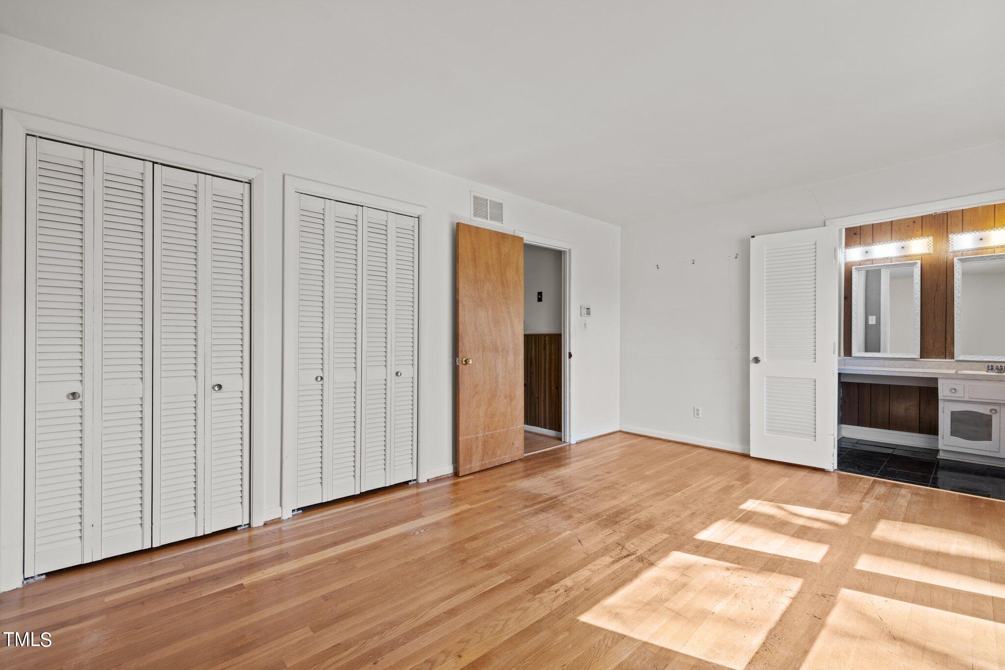 4705 Latimer Road Raleigh, NC 27609 - Photo 23 of 51 a view of an empty room with a window and fire place