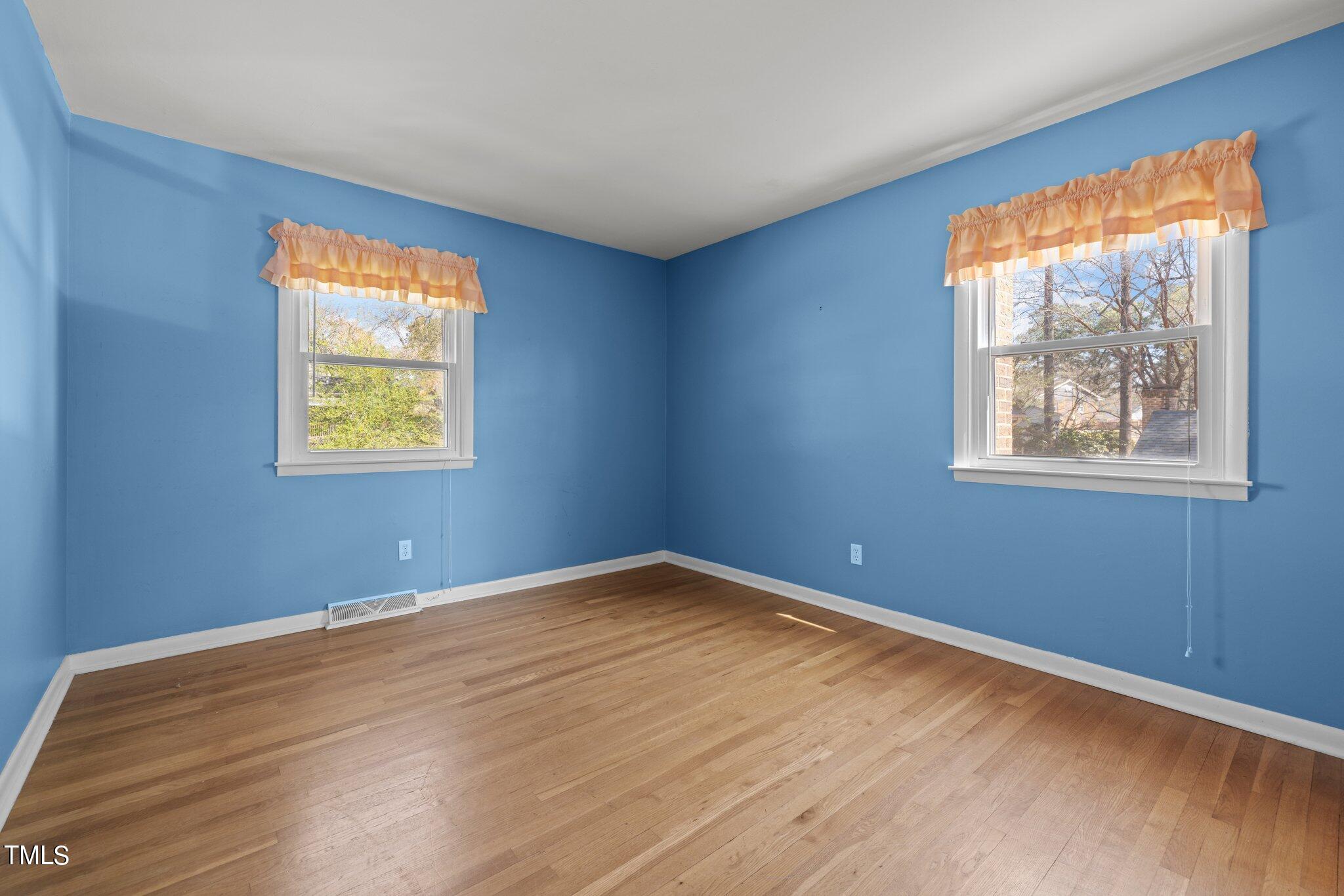 4705 Latimer Road Raleigh, NC 27609 - Photo 26 of 51 a view of an empty room with a window