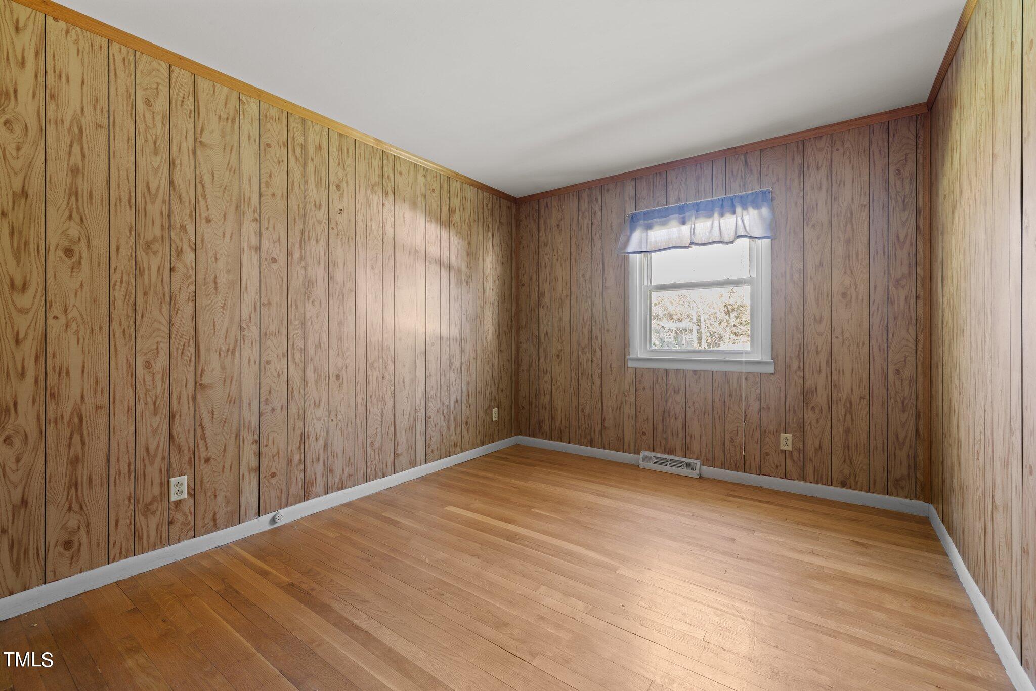 4705 Latimer Road Raleigh, NC 27609 - Photo 30 of 51 an empty room with windows